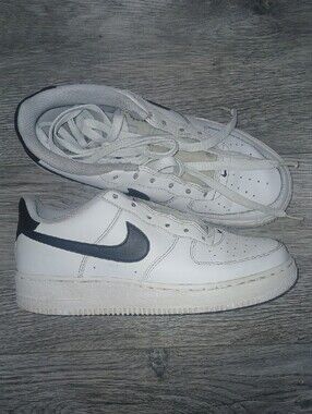 Nike Men’s White Sneakers with Black Swoosh